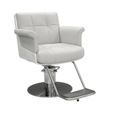 White leather salon chair with chrome base on a white background